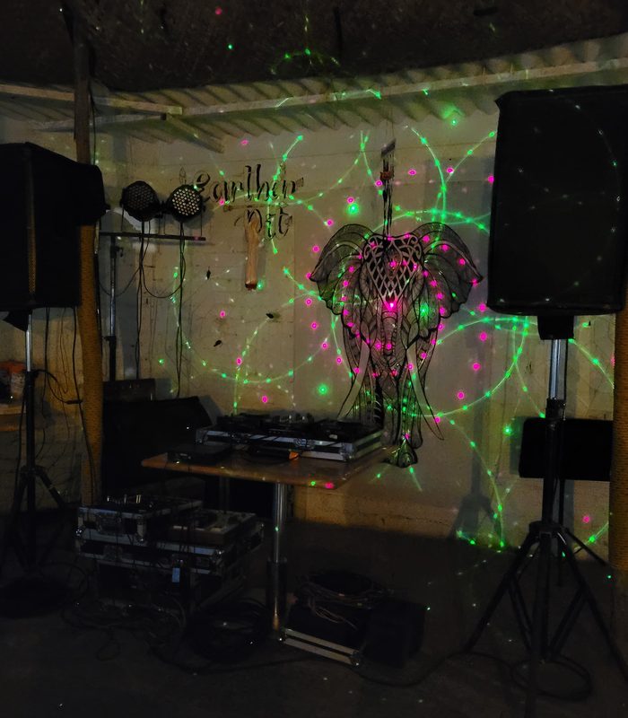 the café stage with the decks and speakers set up