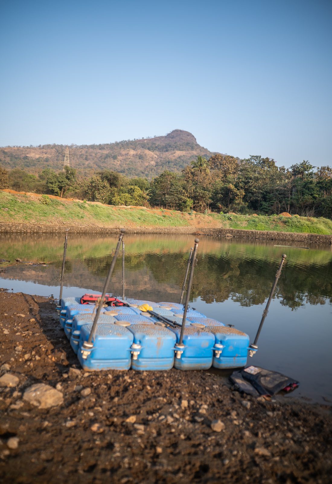 the private lake, pedal boats moored at the bank