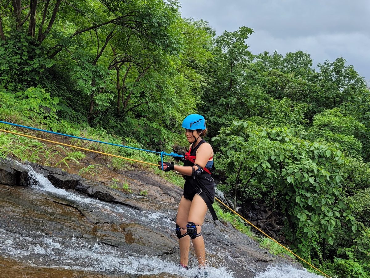 the wet trail down beside the waterfall