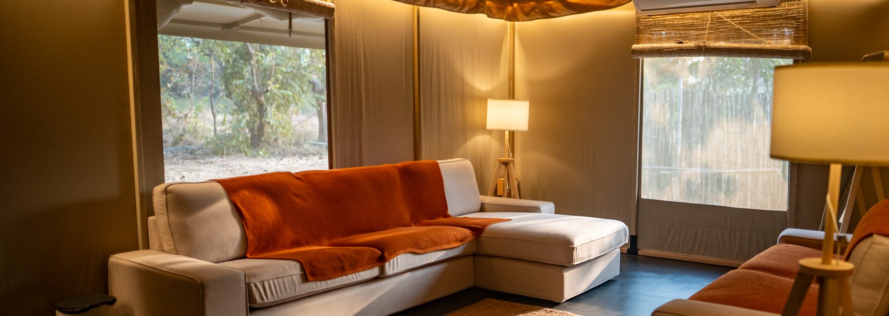 the lounge sectional under the window wall
