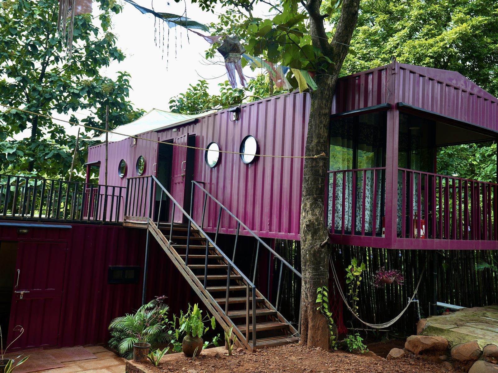 container home exterior with terrace and stair