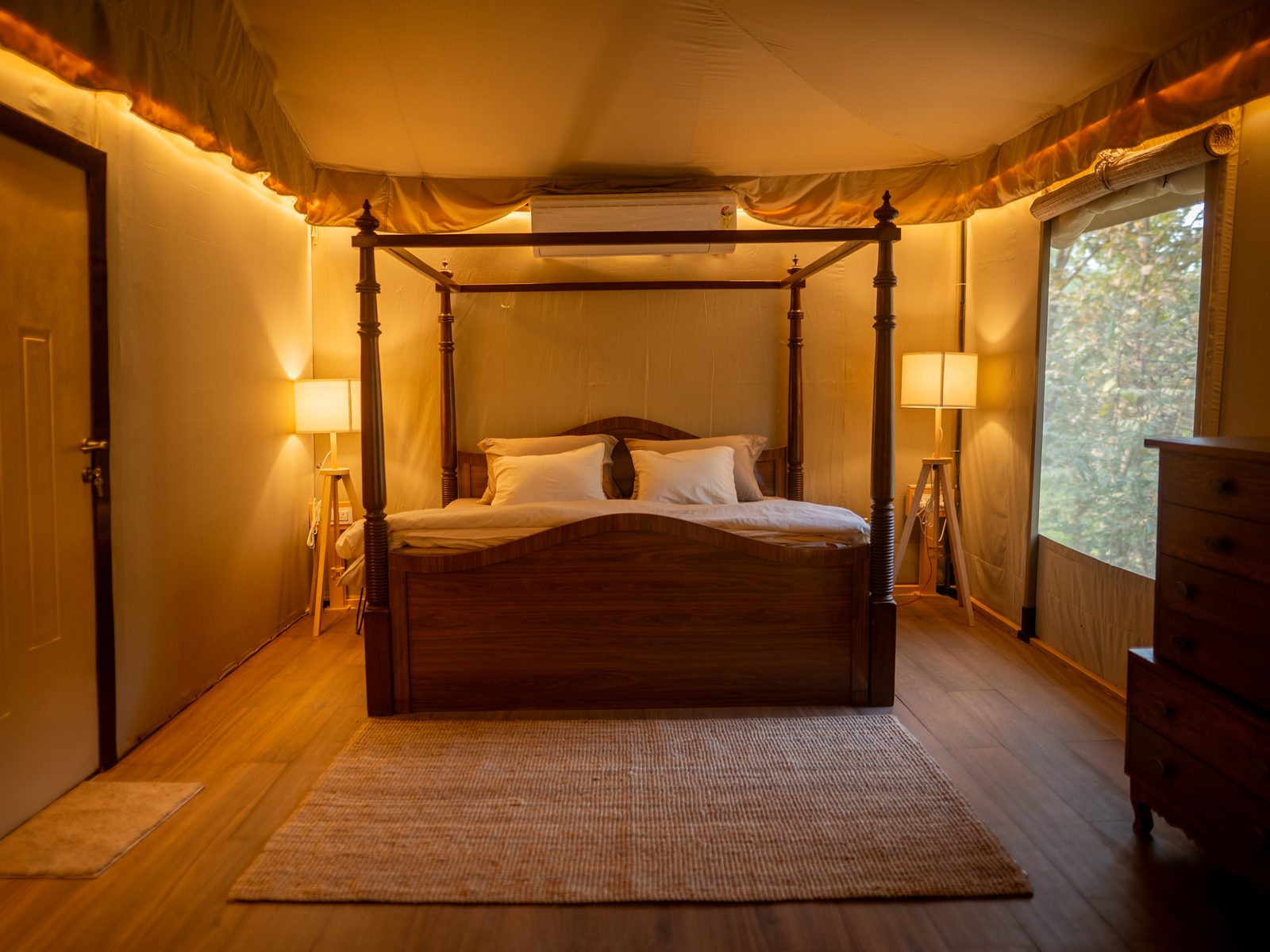 a four-poster bedroom in the mansion